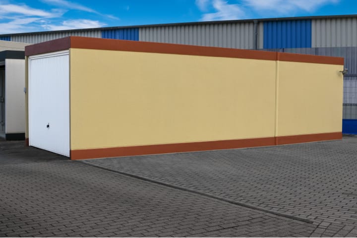 Einzelgarage mit Anbau aus Stahlbeton als Fertiggarage von JUWEL